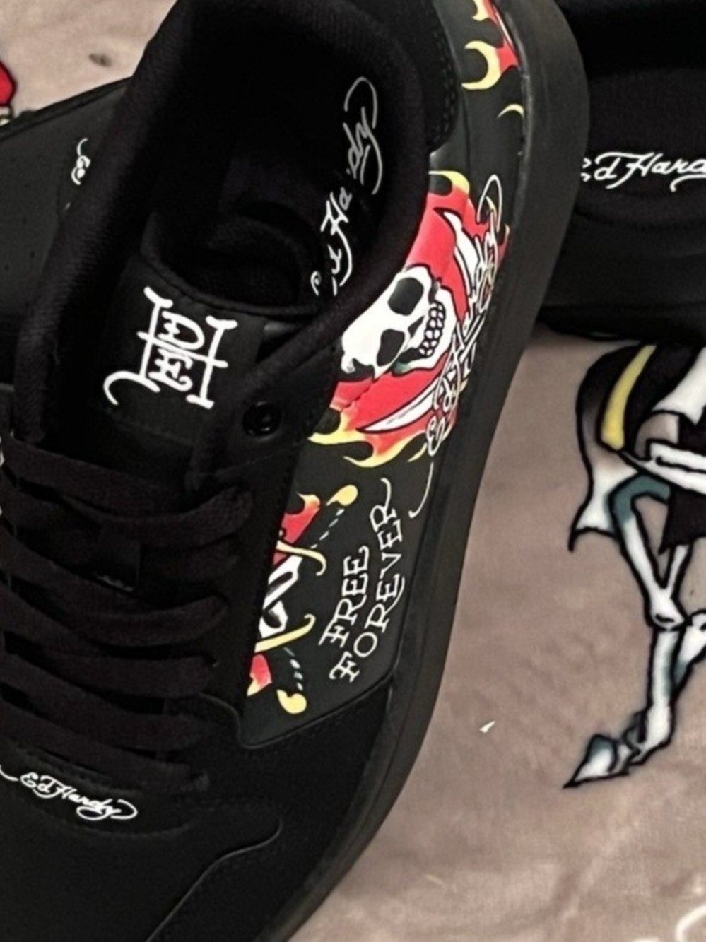 Ed Hardy Black Sneakers with Red & Yellow Skull Graphic